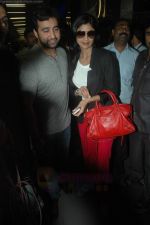 Shilpa Shetty, Raj Kundra snapped at International Airport, Mumbai on 27th Aug 2011 (15).JPG
